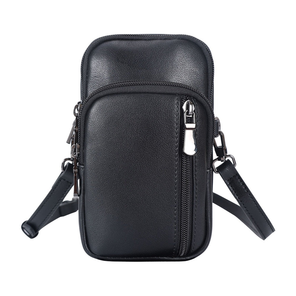 Black leather mini messenger bag, side view with shoulder strap