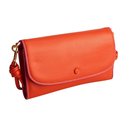 Orange bonded leather flap clutch bag with snap closure, front view